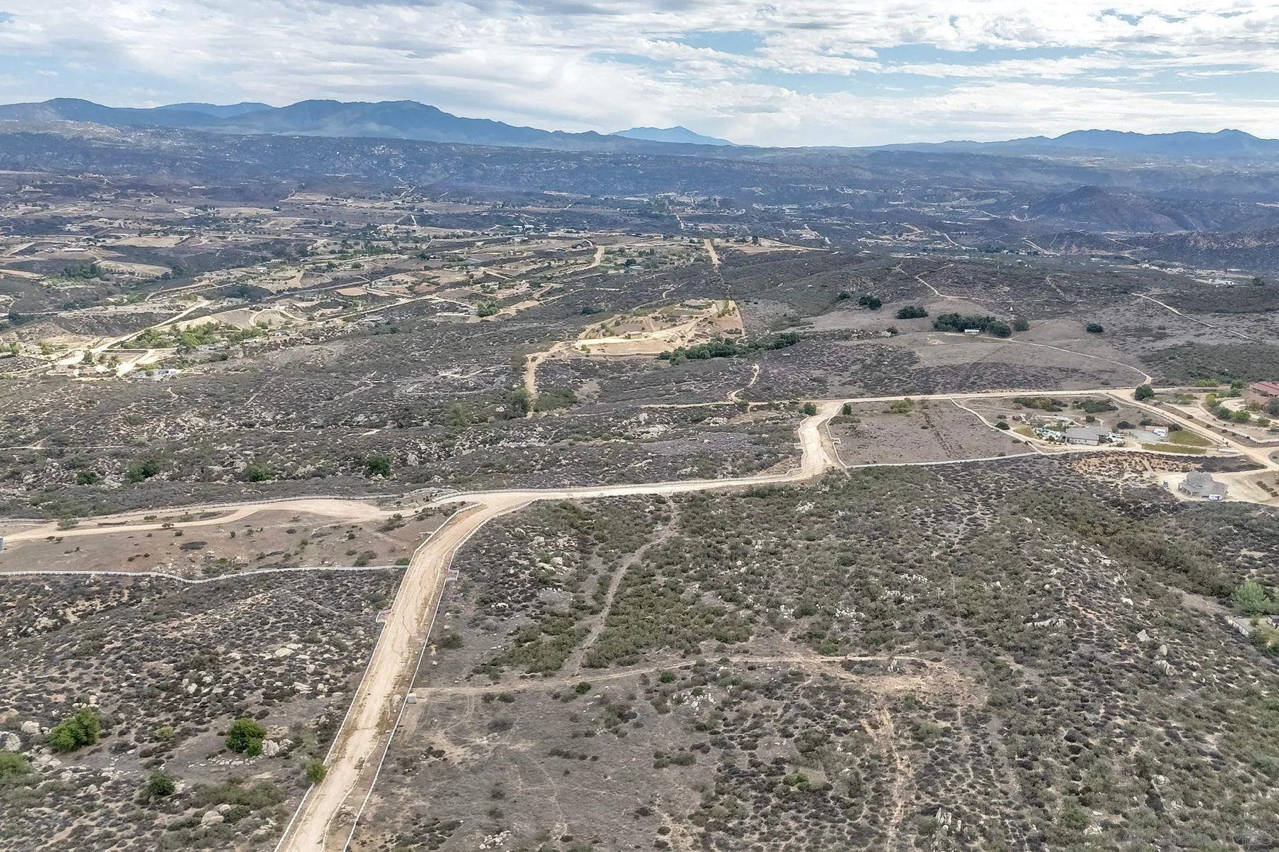39470 Calle Rio Grande Trail, Unit 7 Temecula, CA 92592 - Photo 12 of 28 a view of a field with an ocean
