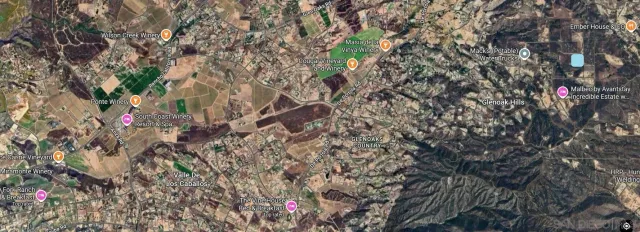 a view of a lake with a city