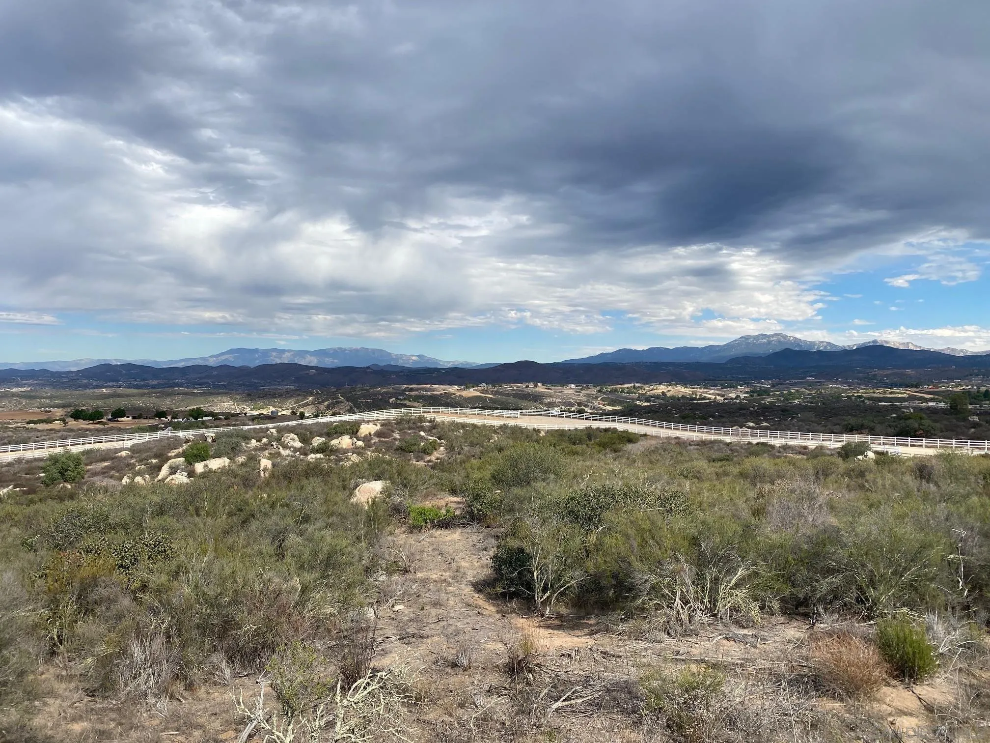 39470 Calle Rio Grande Trail, Unit 7 Temecula, CA 92592 - Photo 26 of 28 a view of a lake with a city
