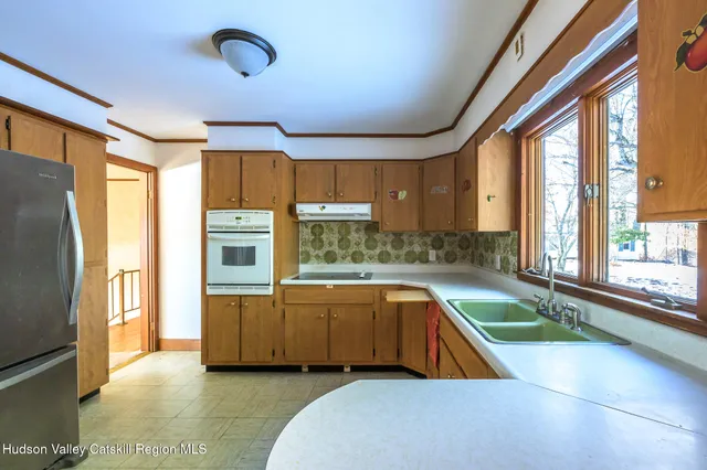 a view of a livingroom with wooden floor