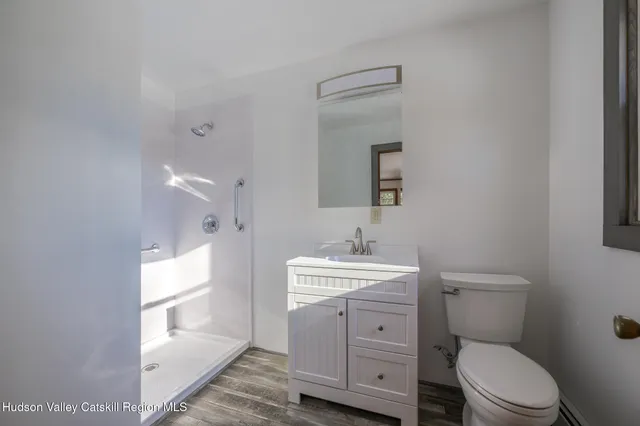 a view of a swimming pool and a yard