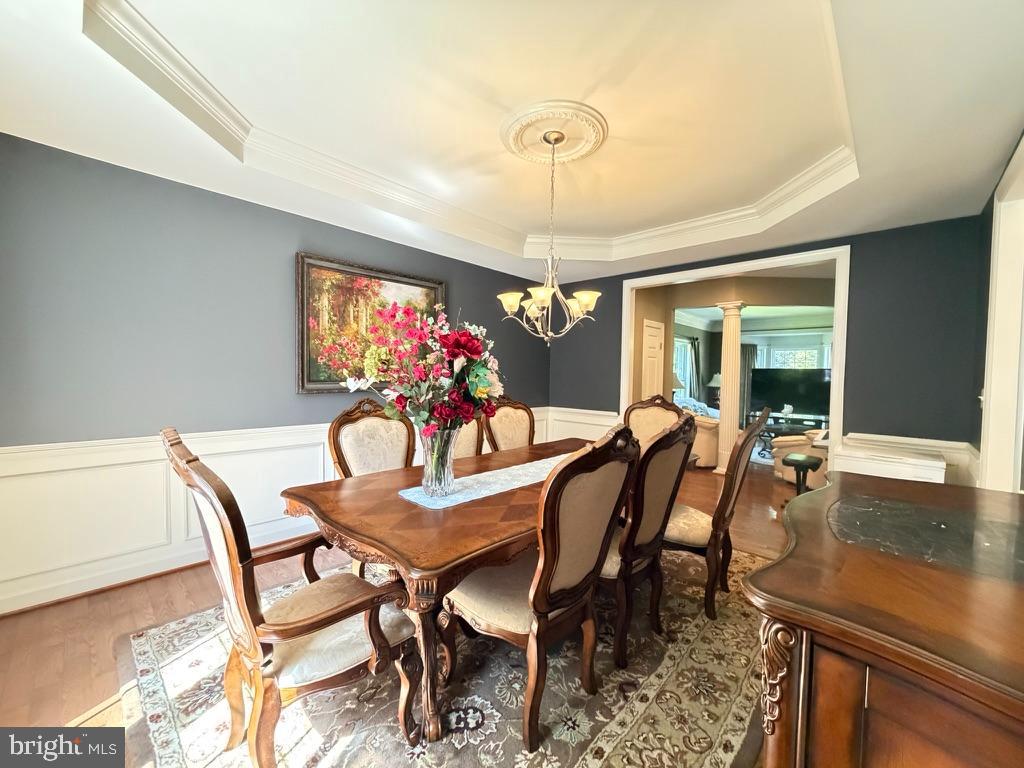 9804 Anvil Court Perry Hall, MD 21128 - Photo 5 of 21 a view of a dining room with furniture window and wooden floor