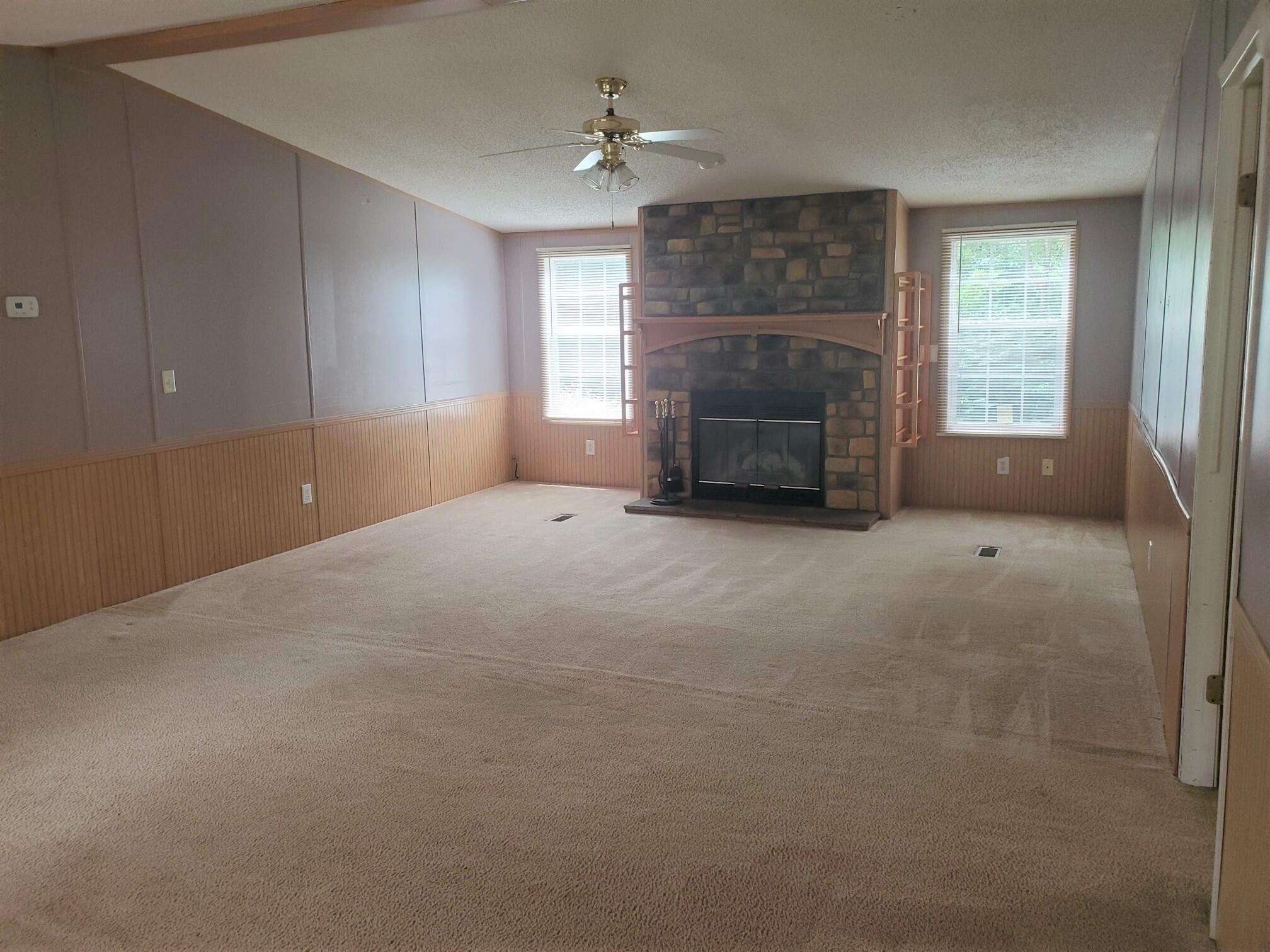 107 Meadowlark Road Blue Ridge, VA 24064 - Photo 4 of 18 Great Room with Wood Burning Fireplace