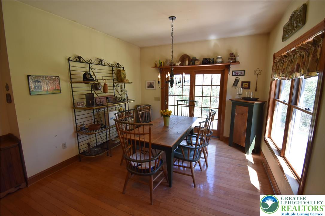 415 Colver Road Nazareth, PA 18064 - Photo 15 of 41 a view of a dining room with furniture window and wooden floor