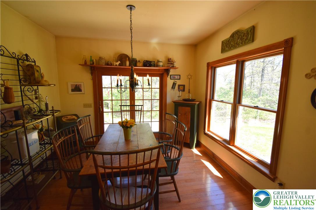 415 Colver Road Nazareth, PA 18064 - Photo 18 of 41 a dining room with furniture window wooden floor