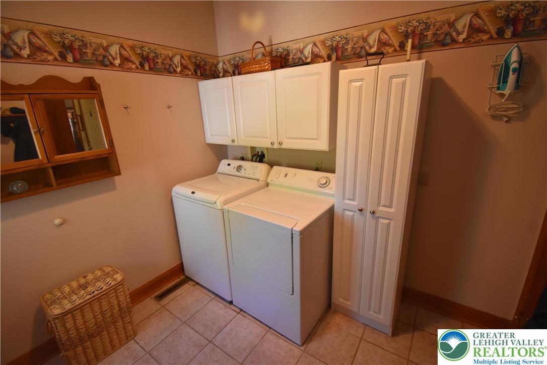 415 Colver Road Nazareth, PA 18064 - Photo 20 of 41 a utility room with dryer and washer