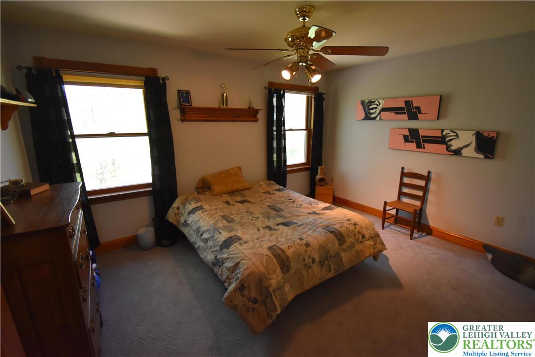 415 Colver Road Nazareth, PA 18064 - Photo 33 of 41 a bedroom with a bed and a window