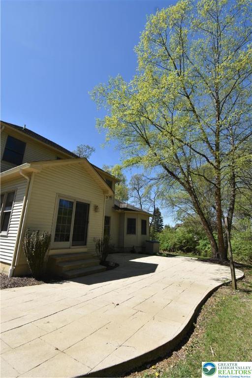415 Colver Road Nazareth, PA 18064 - Photo 6 of 41 a front view of a house with a yard
