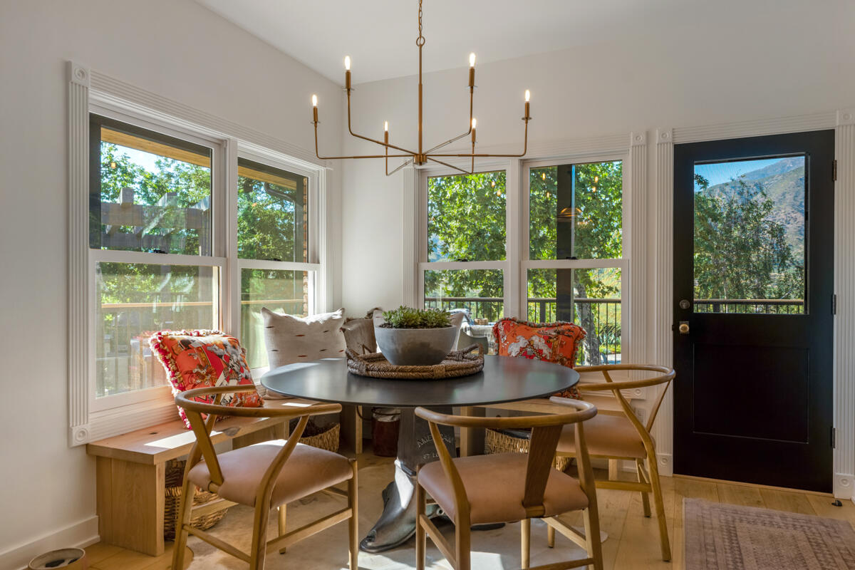 13100 Ojai Road Santa Paula, CA 93060 - Photo 22 of 60 a dining room with furniture window wooden floor