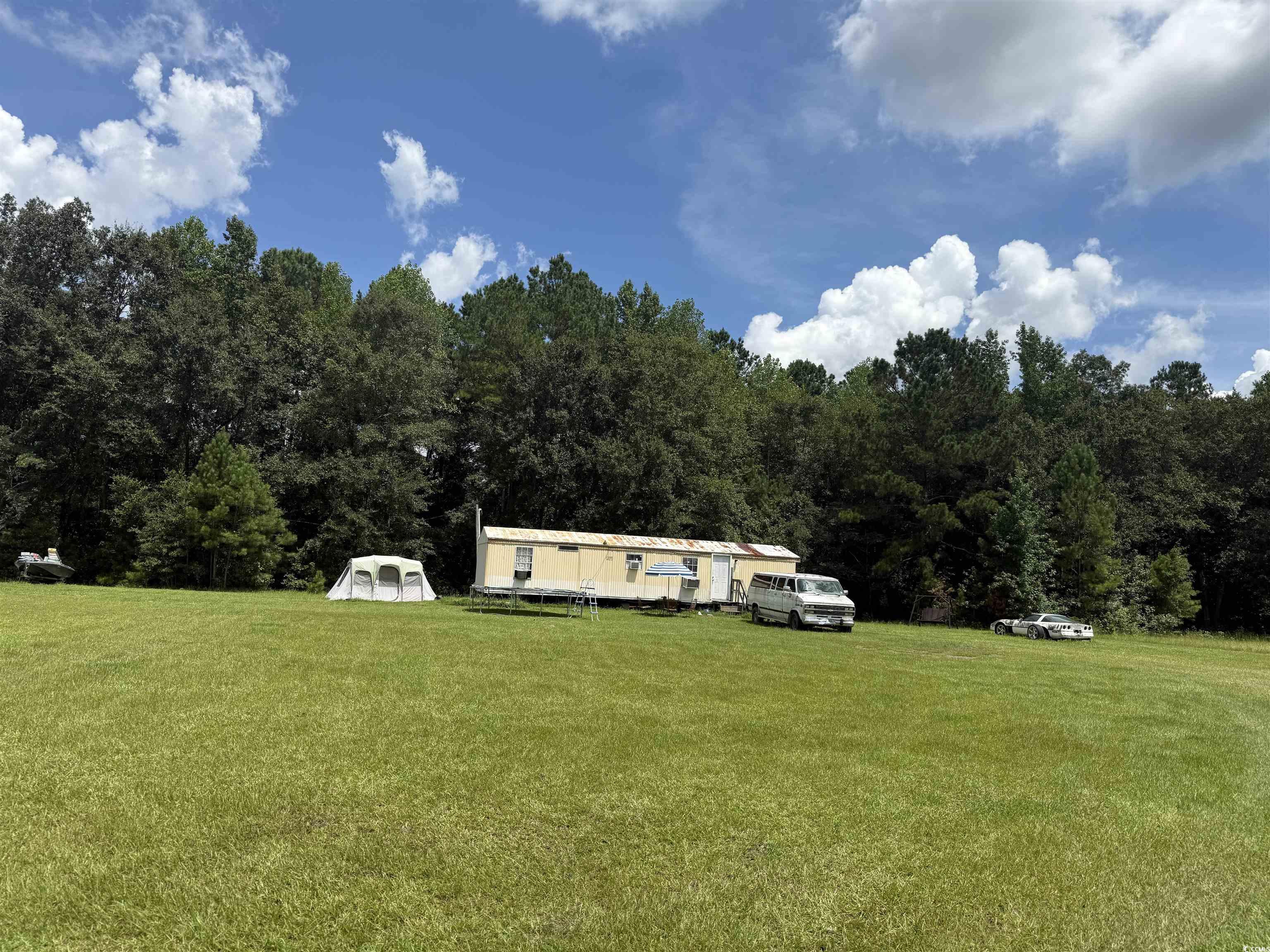 Tbd Morrisville Road Andrews, SC 29510 - Photo 5 of 29 View of grassy yard featuring a view of trees