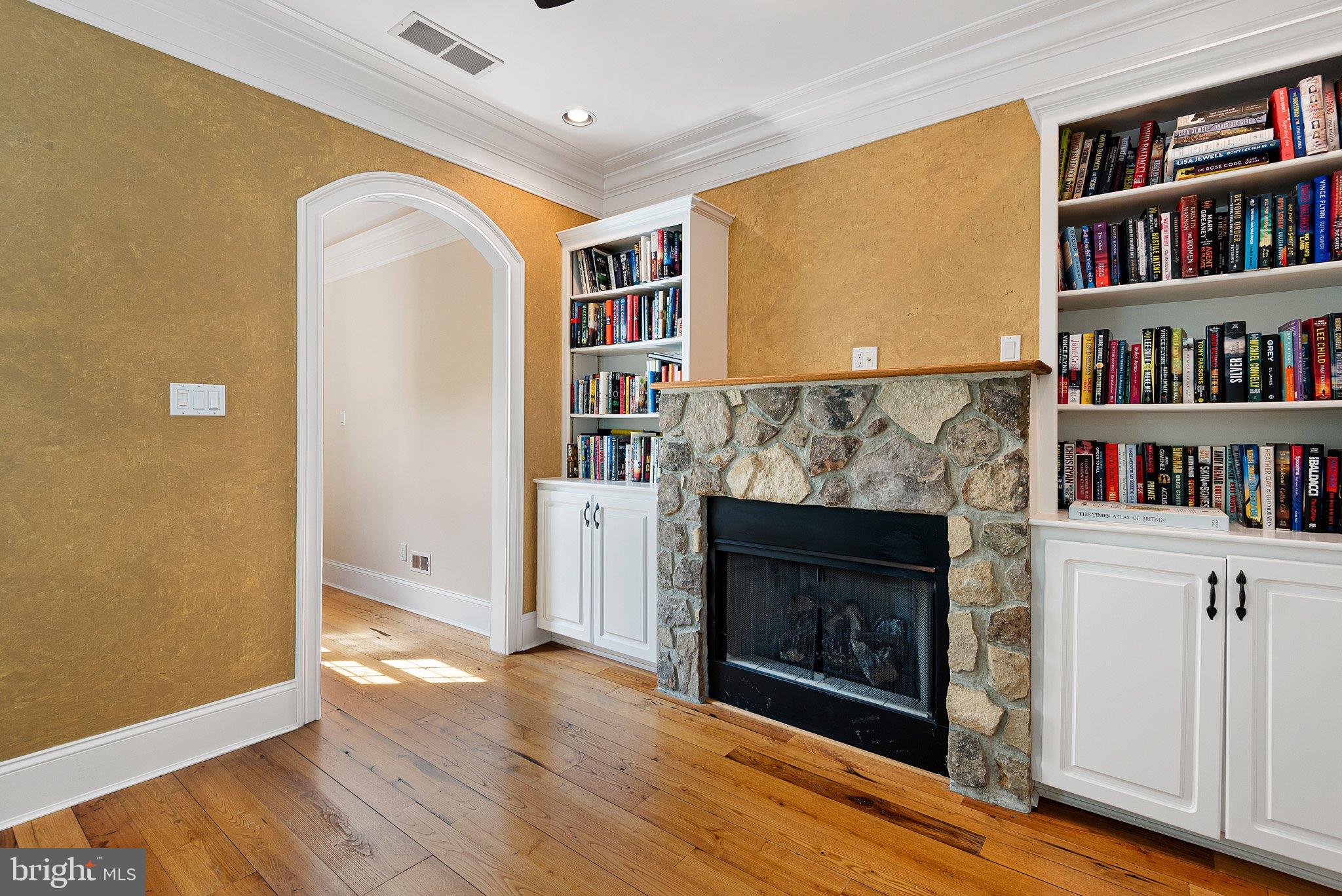 104 Timber Ridge Lane Chadds Ford, PA 19317 - Photo 33 of 65 a living room with furniture and a fireplace