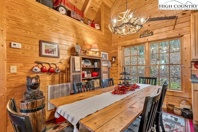 a outdoor space with lots of furniture and lots of tables