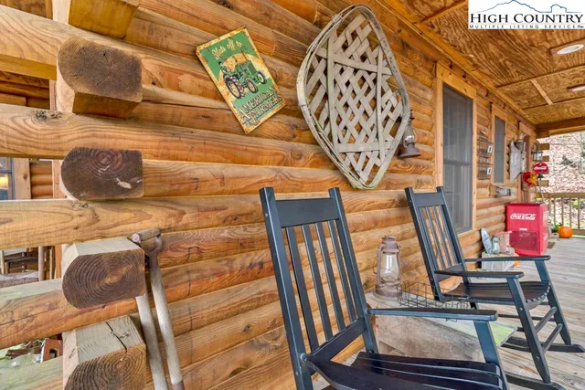 a view of entryway with wooden door