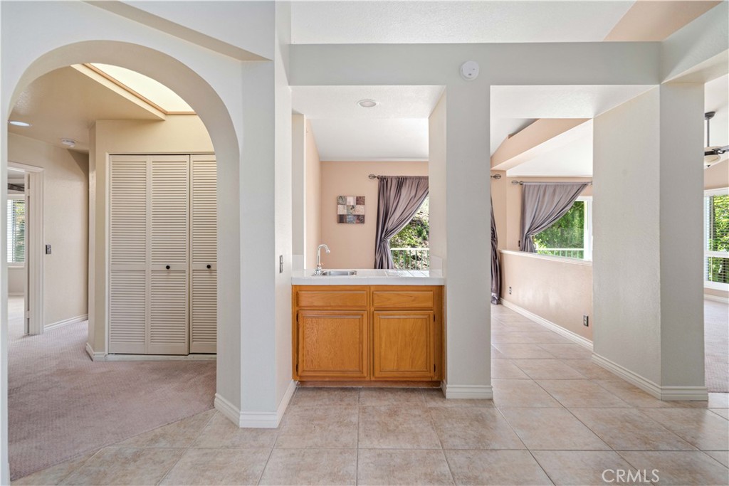 498 Shelburne Lane, Unit B Simi Valley, CA 93065 - Photo 11 of 47 a view of room with window and wooden floor