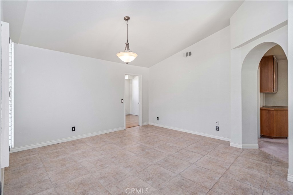498 Shelburne Lane, Unit B Simi Valley, CA 93065 - Photo 12 of 47 a view of an empty room with a window