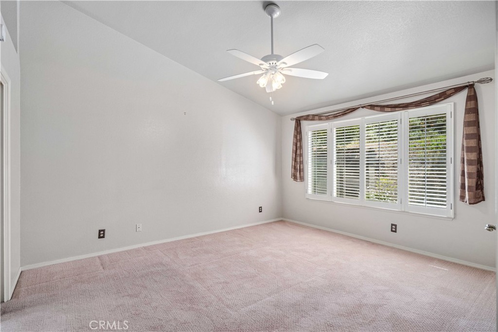 498 Shelburne Lane, Unit B Simi Valley, CA 93065 - Photo 20 of 47 a view of an empty room with a window