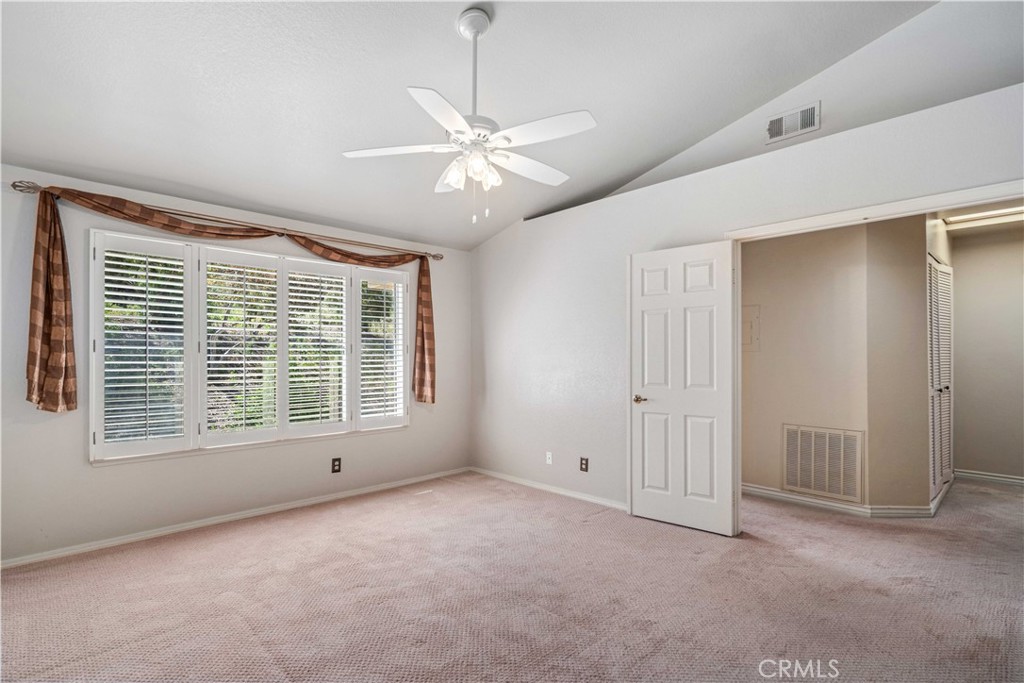 498 Shelburne Lane, Unit B Simi Valley, CA 93065 - Photo 21 of 47 a view of an empty room with a window