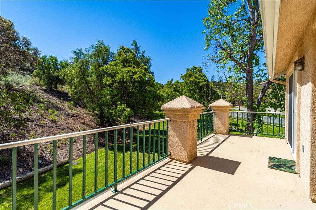 498 Shelburne Lane, Unit B Simi Valley, CA 93065 - Photo 31 of 47 a view of a balcony with wooden floor