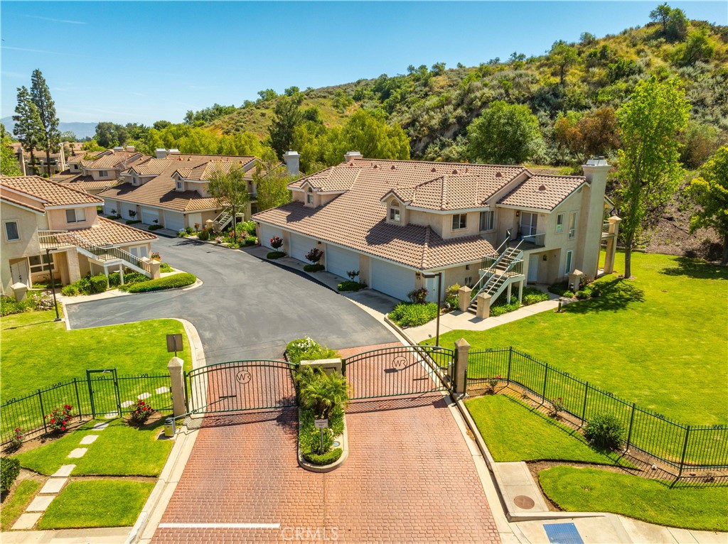 498 Shelburne Lane, Unit B Simi Valley, CA 93065 - Photo 34 of 47 an aerial view of a house with swimming pool