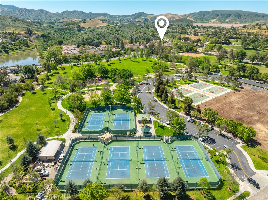 498 Shelburne Lane, Unit B Simi Valley, CA 93065 - Photo 44 of 47 an aerial view of residential houses with outdoor space and trees