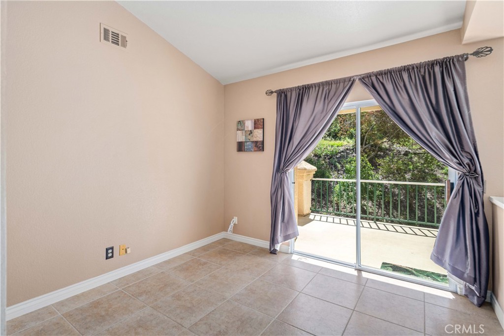 498 Shelburne Lane, Unit B Simi Valley, CA 93065 - Photo 10 of 47 a view of an empty room and window