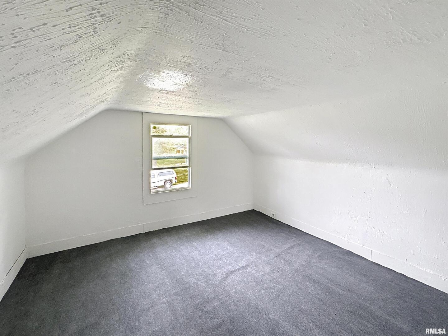 204 Main Avenue Matherville, IL 61263 - Photo 22 of 27 an empty room with a window