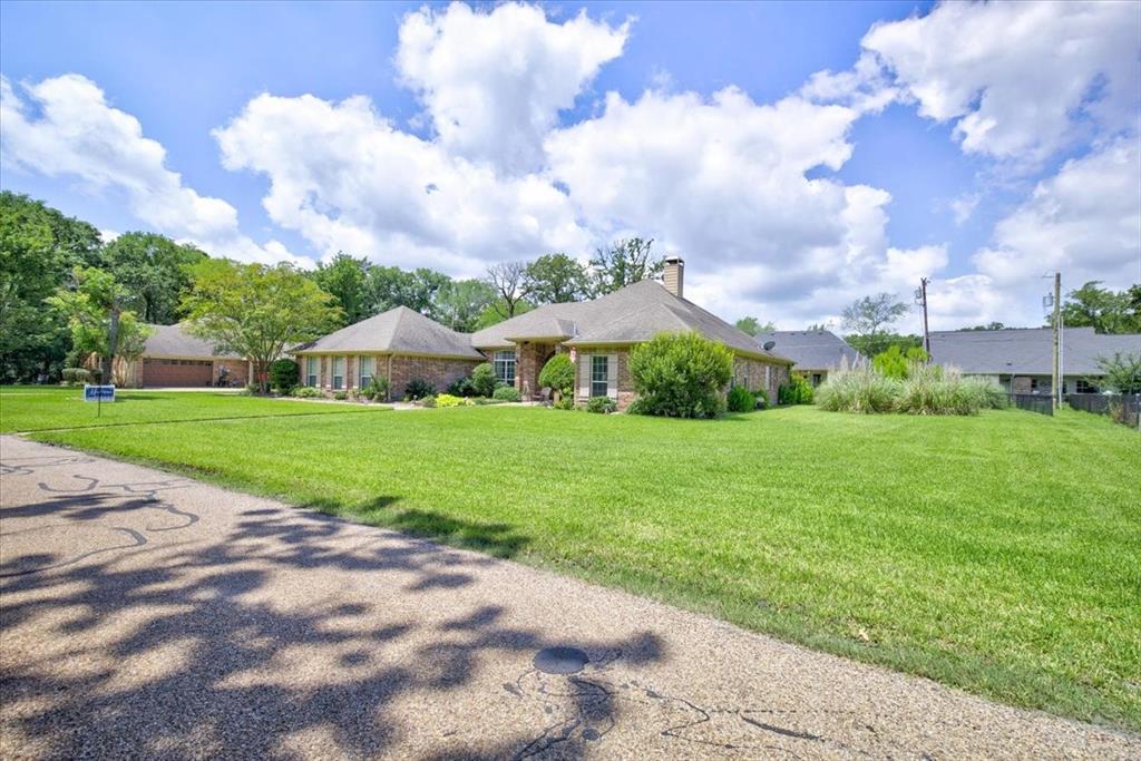 111 Trailwood Road Enchanted Oaks, TX 75156 - Photo 2 of 33 a view of a garden with an apartment