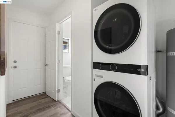 a view of a hallway with washer and dryer