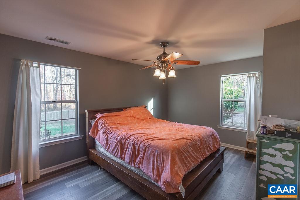 142 Rucker Drive Ruckersville, VA 22968 - Photo 11 of 19 a bedroom with a bed and window