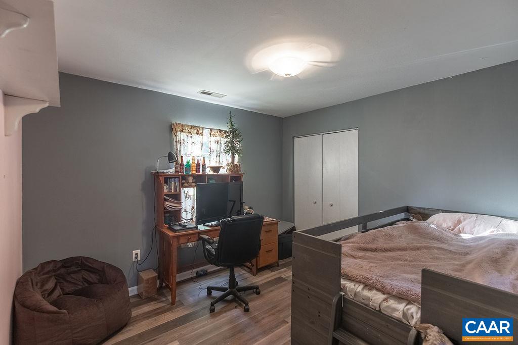 142 Rucker Drive Ruckersville, VA 22968 - Photo 13 of 19 a bedroom with a bed and a window