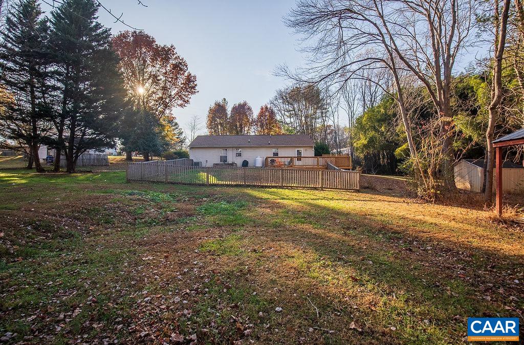 142 Rucker Drive Ruckersville, VA 22968 - Photo 17 of 19 a view of a house with a yard and sitting area