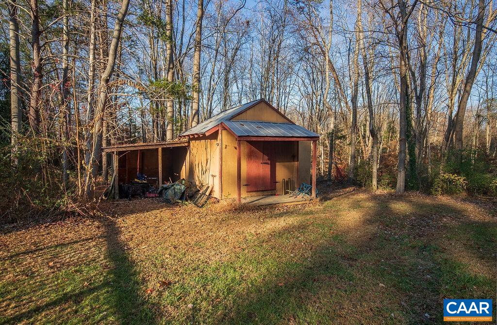 142 Rucker Drive Ruckersville, VA 22968 - Photo 18 of 19 a front view of a house with a yard and garage