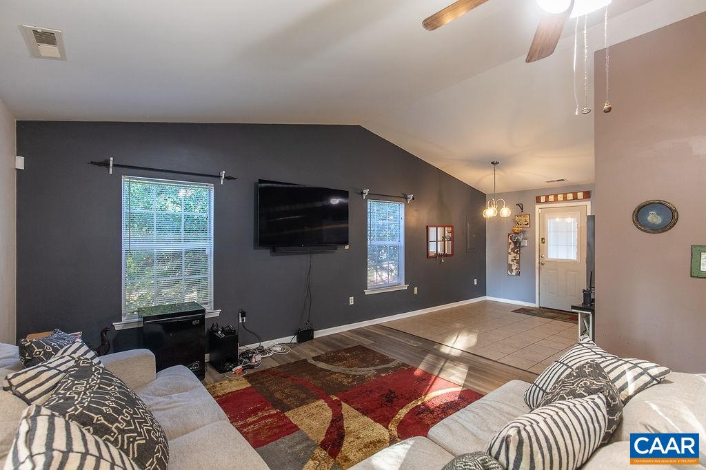 142 Rucker Drive Ruckersville, VA 22968 - Photo 5 of 19 a bedroom with a bed and a flat screen tv