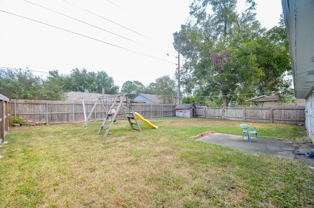 a view of a park with swings