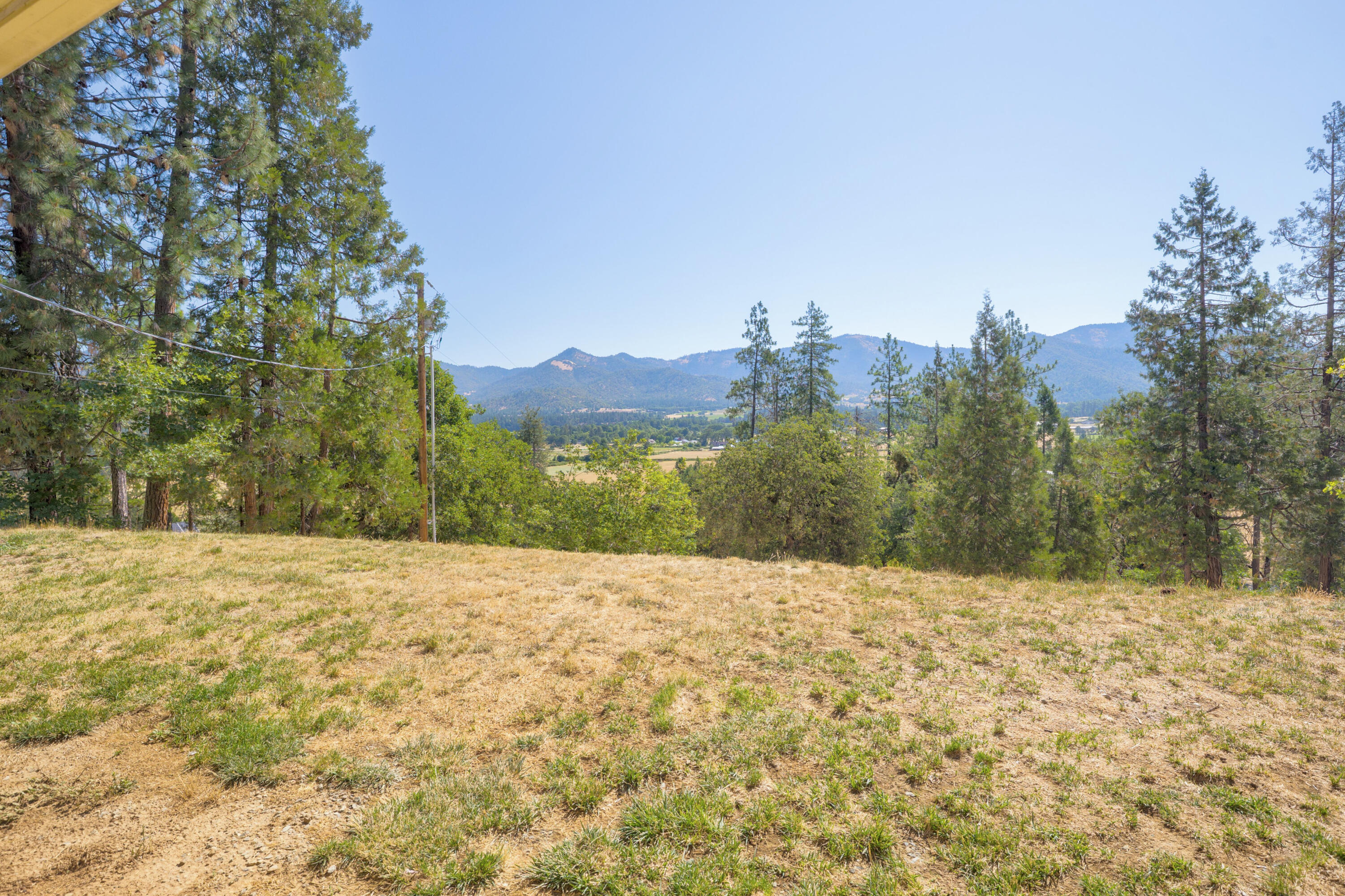 12748 Water Gap Road Williams, OR 97544 - Photo 30 of 35 a view of an outdoor space and a yard