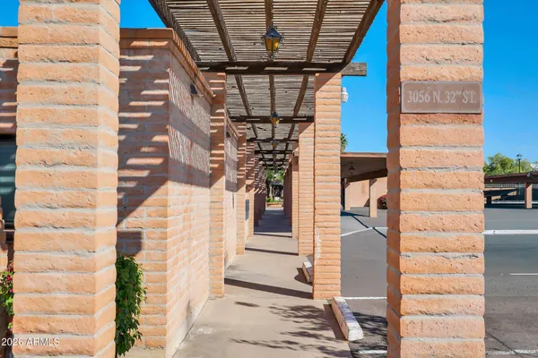 a couch sitting in front of a building