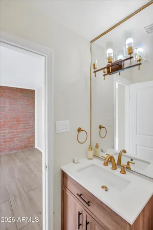 a bathroom with a toilet and a sink