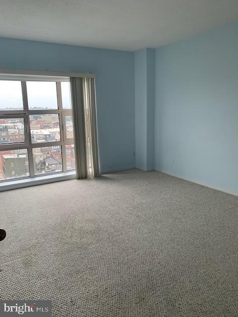 250 President Street, Unit 603 Baltimore, MD 21202 - Photo 11 of 40 a view of an empty room with a window