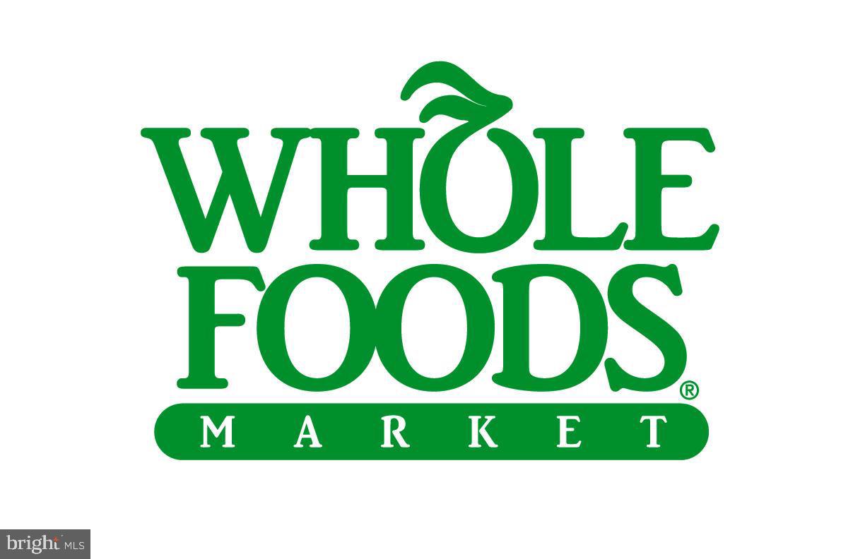 250 President Street, Unit 603 Baltimore, MD 21202 - Photo 21 of 40 a street sign that is on a wooden wall