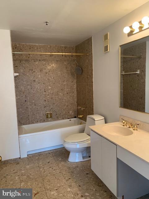 250 President Street, Unit 603 Baltimore, MD 21202 - Photo 8 of 40 a bathroom with a sink a toilet and shower