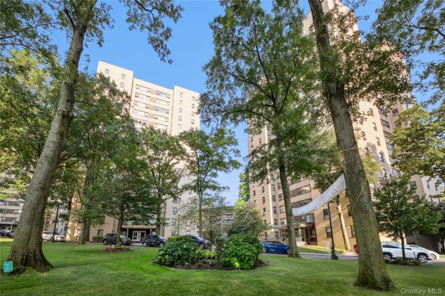 a view of a building with a yard