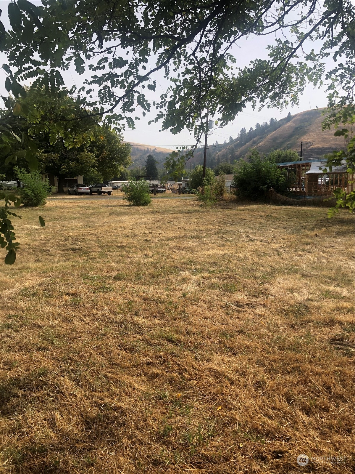 124 Murphy Street Waitsburg, WA 99361 - Photo 7 of 7 a view of outdoor space with deck and yard