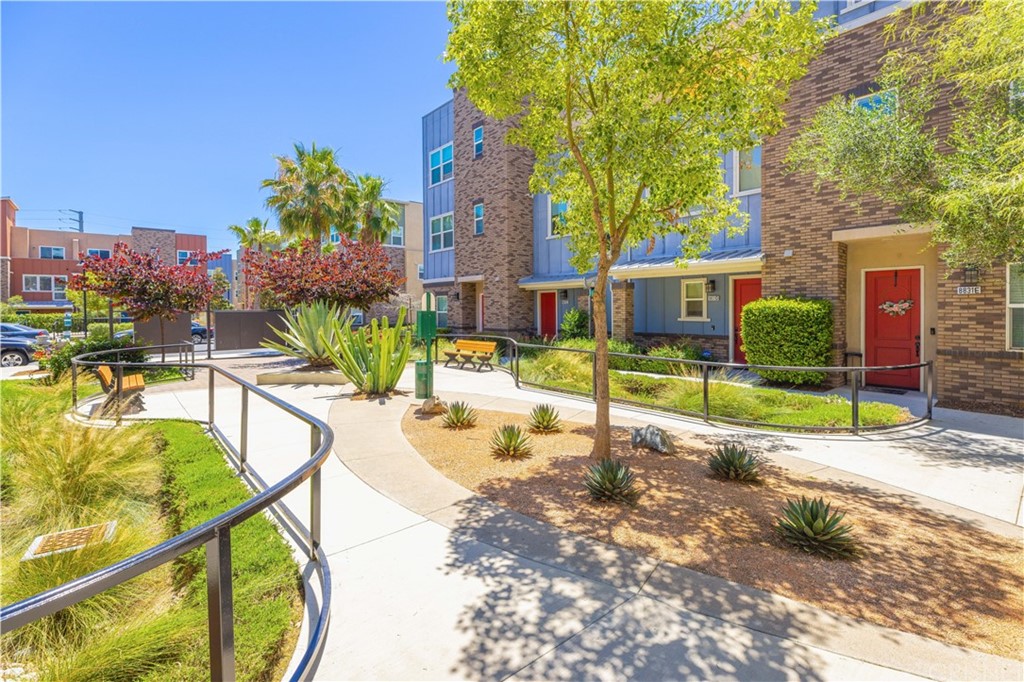 4951 Ash Avenue, Unit E Montclair, CA 91763 - Photo 39 of 41 a view of a house with backyard and sitting area
