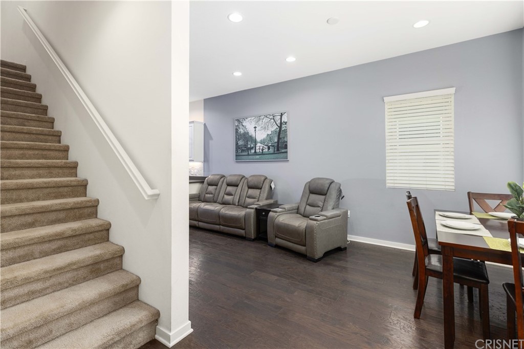 4951 Ash Avenue, Unit E Montclair, CA 91763 - Photo 7 of 41 a workspace with furniture and stairs