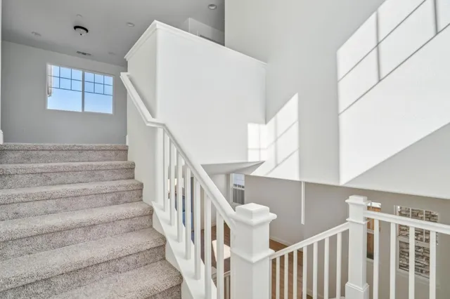 a view of storage and utility room with racks on the wall