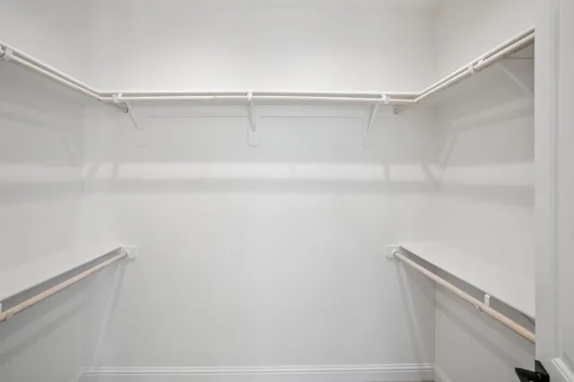 a bathroom with a shower and a shower