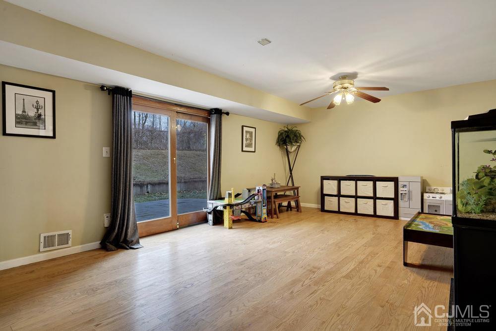 46 Brookside Road Edison, NJ 08817 - Photo 18 of 38 a view of livingroom with furniture and windows