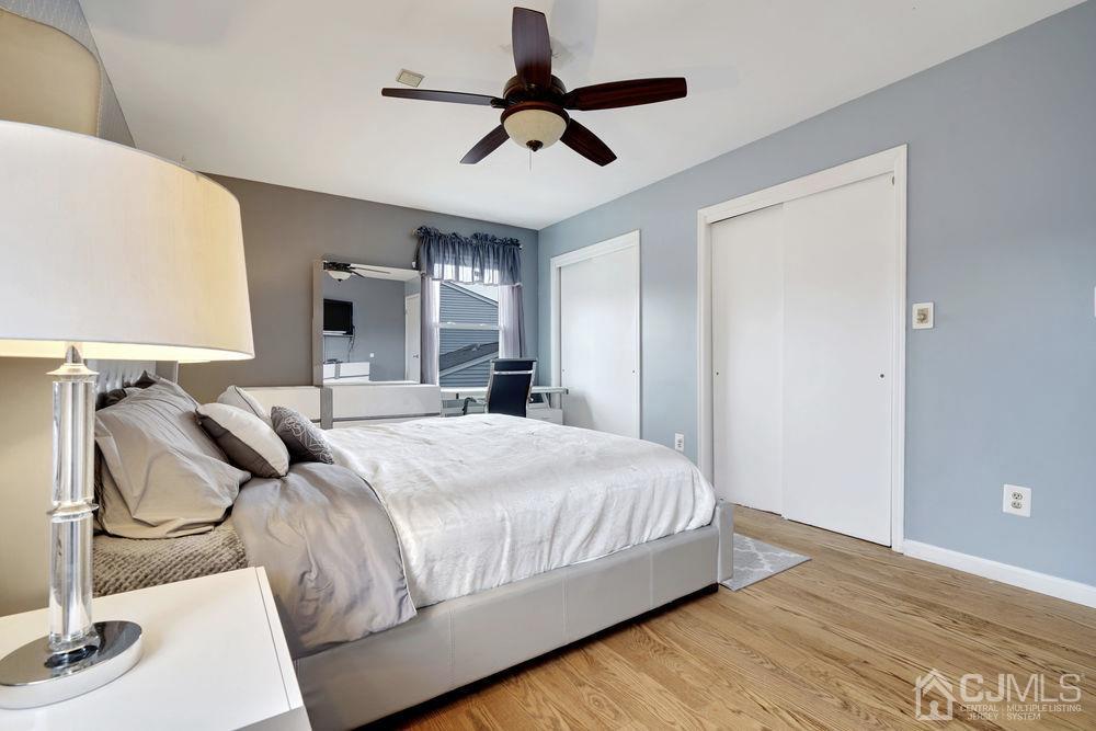 46 Brookside Road Edison, NJ 08817 - Photo 22 of 38 a bedroom with a bed couch and window