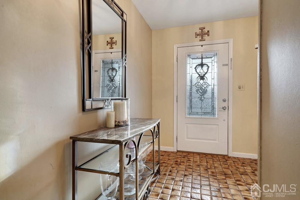 46 Brookside Road Edison, NJ 08817 - Photo 4 of 38 a view of a hallway with interior of the house