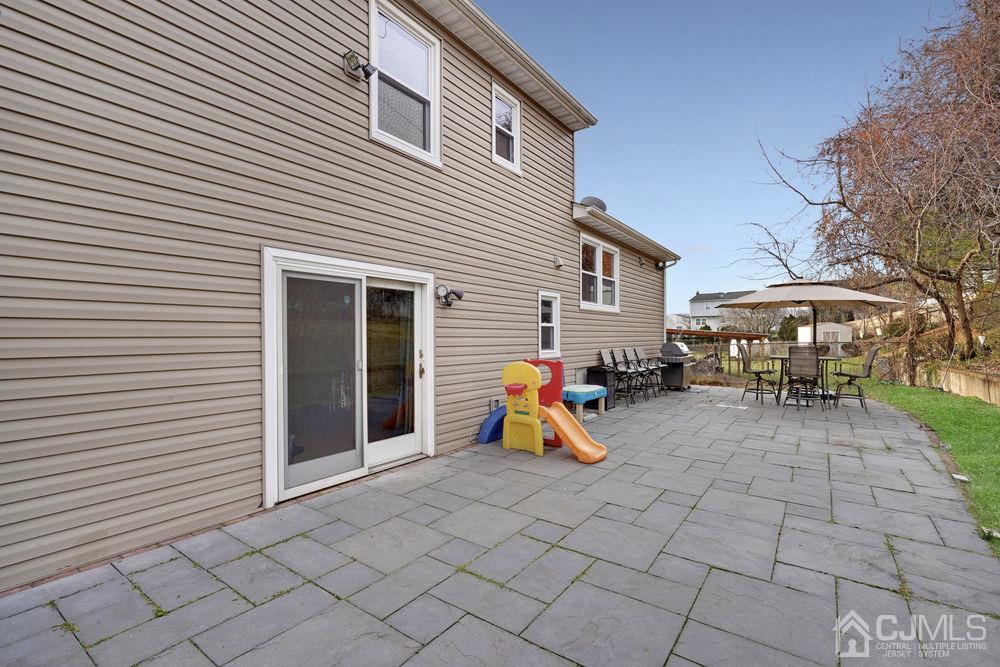 46 Brookside Road Edison, NJ 08817 - Photo 35 of 38 a view of outdoor space with seating